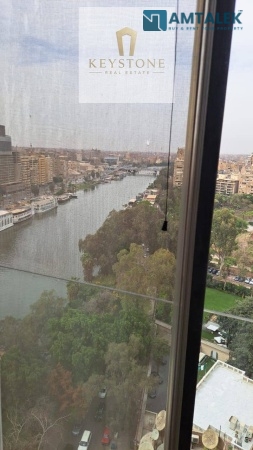 شقة غرفتين مفروشة بالكامل بإطلالة على النيل والمساحات الخضراء في الزمالك