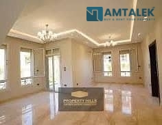 Receive immediately an apartment with a landscape view fully finished in Studio Compound next to Cairo Airport and Wadi Degla Club