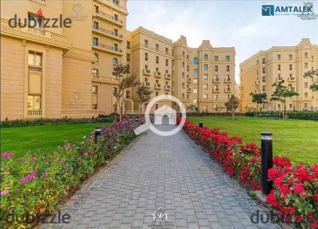 For quick sale: Apartment at half price, immediate occupancy, fully finished with air conditioning, in Garden City Compound, New Administrative Capita
