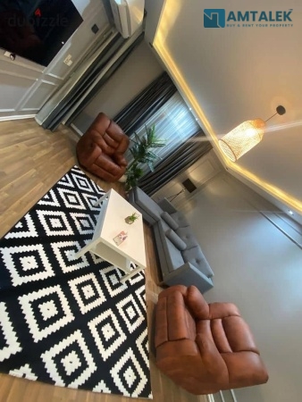 Furnished apartment for rent in Al-Rehab, first occupancy, modern furniture, fully finished special fittings, 2-Bedroom, long and short durations, American kitchen, complete air conditioning, complete appliances