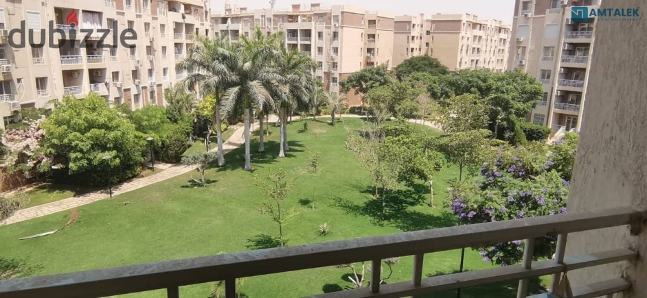 Apartment for rent under a new law in my city with an area of 96m in B7 premium location with a wide garden view and next to the Club of Madinaty and the services area of the phase in Madinaty
