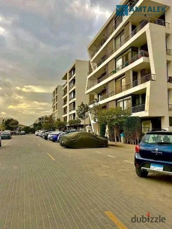 70 sqm garden apartment for sale in Taj Sultan, opposite Cairo Airport