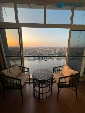 Apartment for rent directly on the Nile — Abu El Feda Street, 3BR/2BA, new first-use